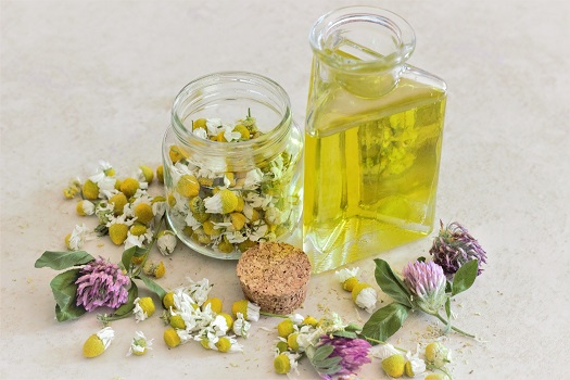 Dried flowers and essential oil used for aromatherapy.