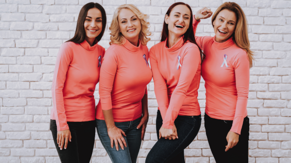 Women wearing pink shirts to support breast cancer research