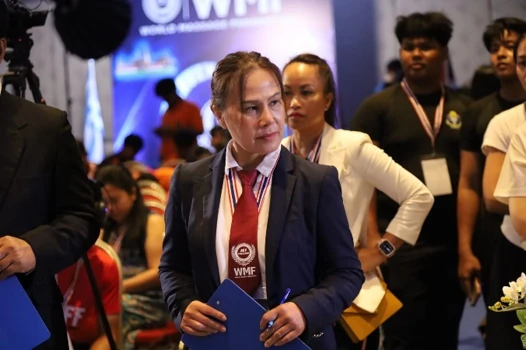 Jel Rasri at a WMF event surrounded by media