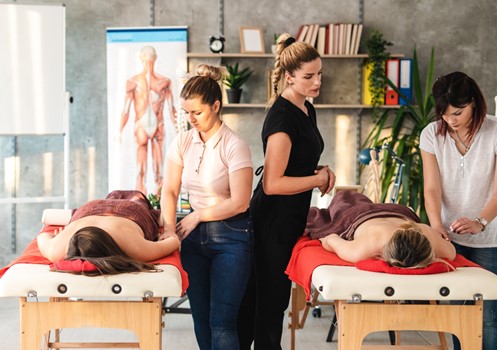 A practical demonstration in a Massage Therapy class. 