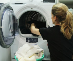 Practitioner doing laundry