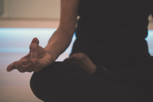Close-up of practitioner in lotus position